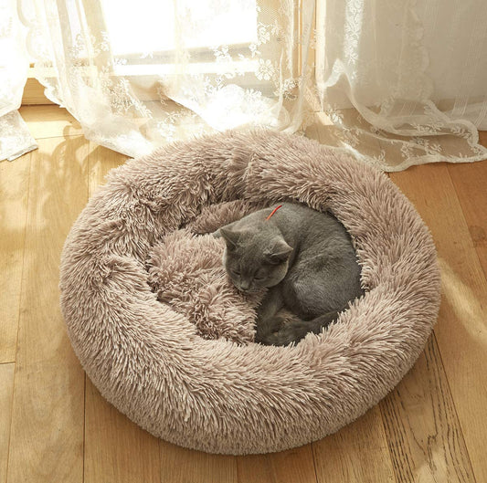 "Cozy and Luxurious Faux Fur Pet Bed - Perfect Snuggle Spot for Dogs & Cats, Stylish and Warm Donut Cuddler Cushion, Ideal for Winter (Pink, 23.6")"